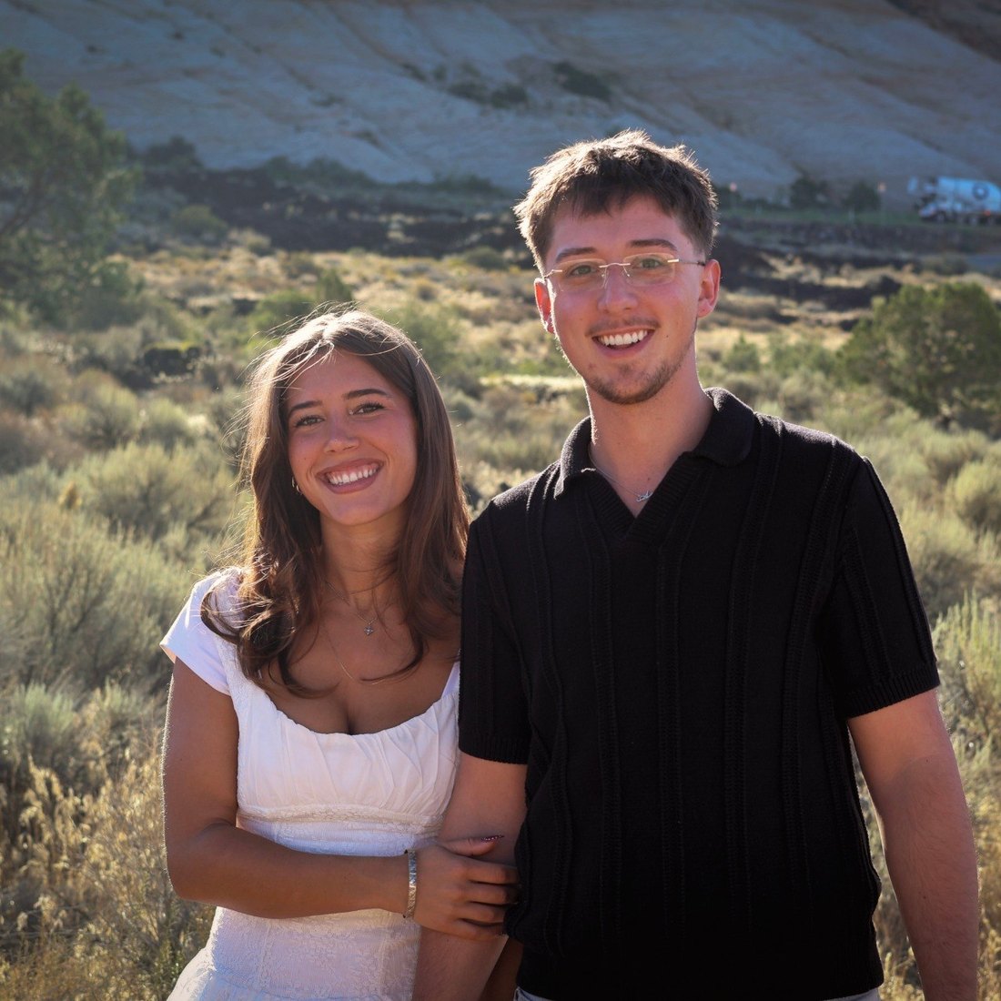 Axel and his wife in the Southern Utah desert at sunset